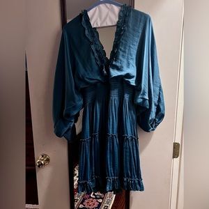 Dark teal cocktail dress.